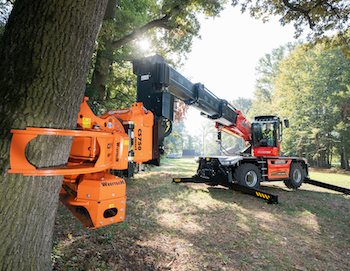 Manitou rotating telehandler with tree processing attachment
