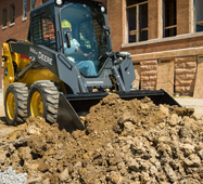 JD grading bucket for skid steers and track loaders