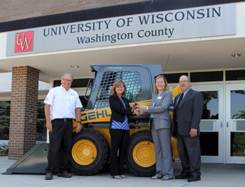 Skid steer donation to UW Washington County