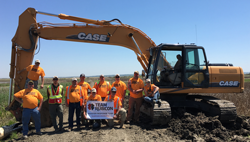 Donated excavator and training for wetland development